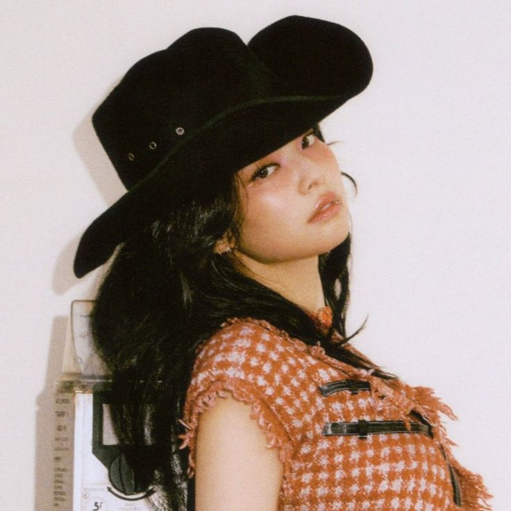 Jennie wearing a black cowboy hat